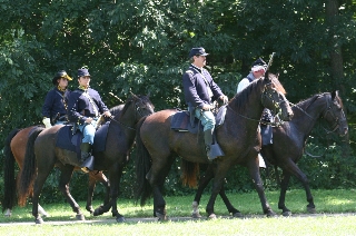 Mounted prepare for battle.